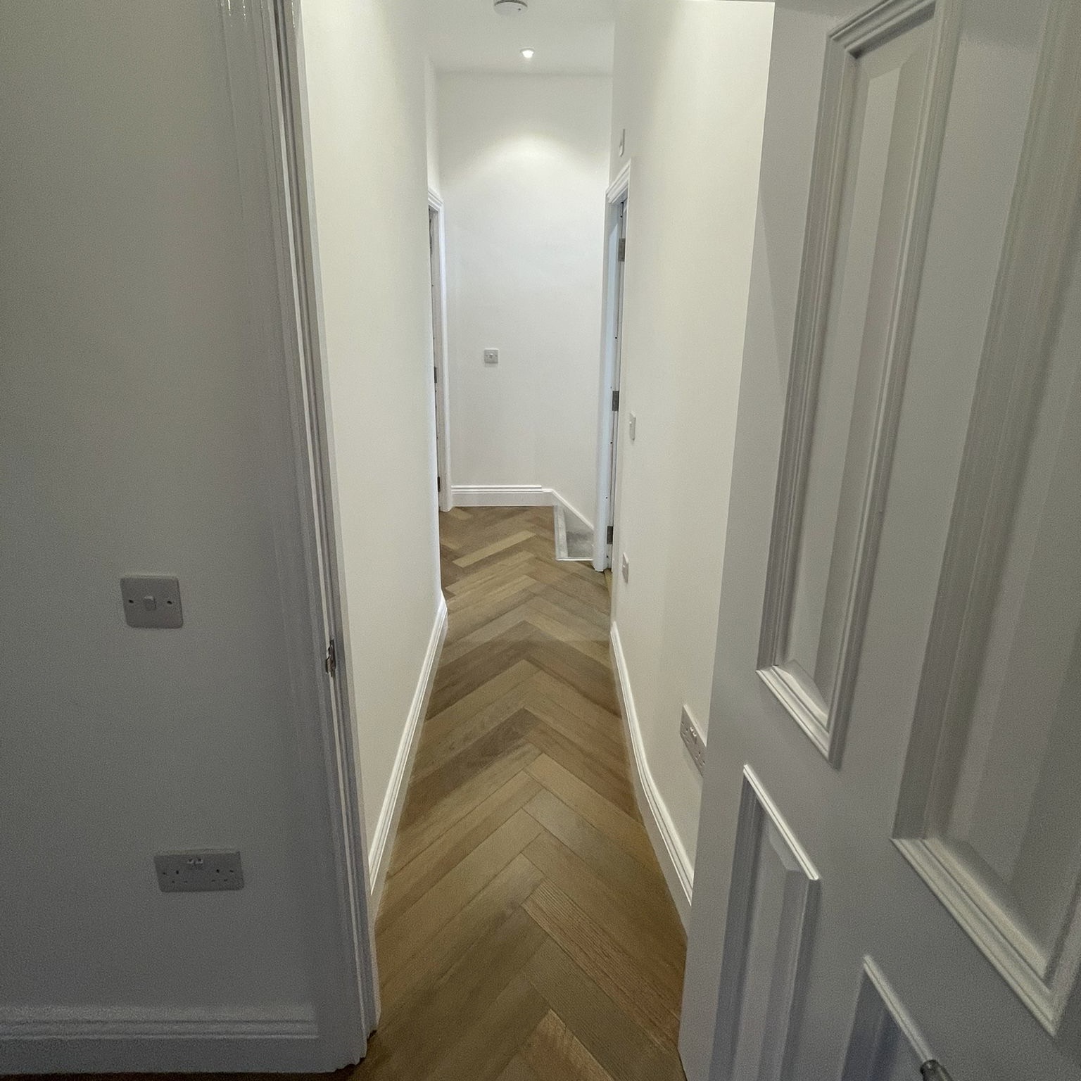 Ealing renovation hallway with herringbone flooring